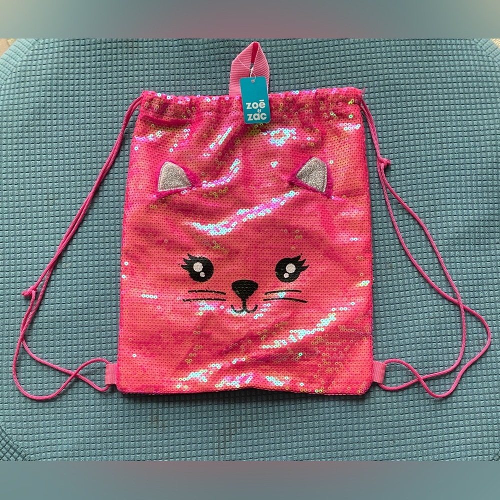 New with tags Zoe & Zac sequin kitty pink draw string bag.